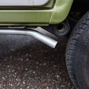 car with old side exhaust pipe