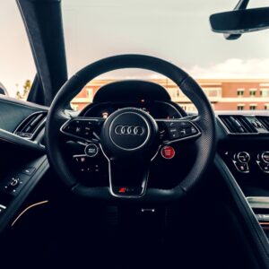 interior and flat bottom steering wheel of an audi r8