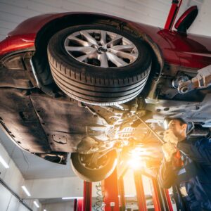 mechanic checking a vehicle