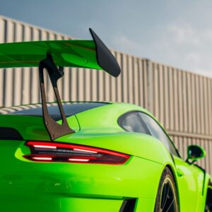 green sportscar with spoiler