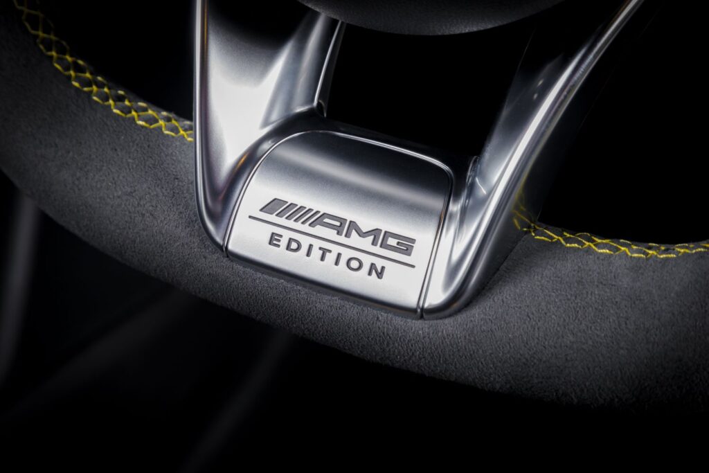 close up shot of a mercedes benz amg logo