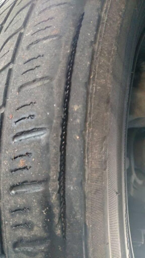 tire showing metal part