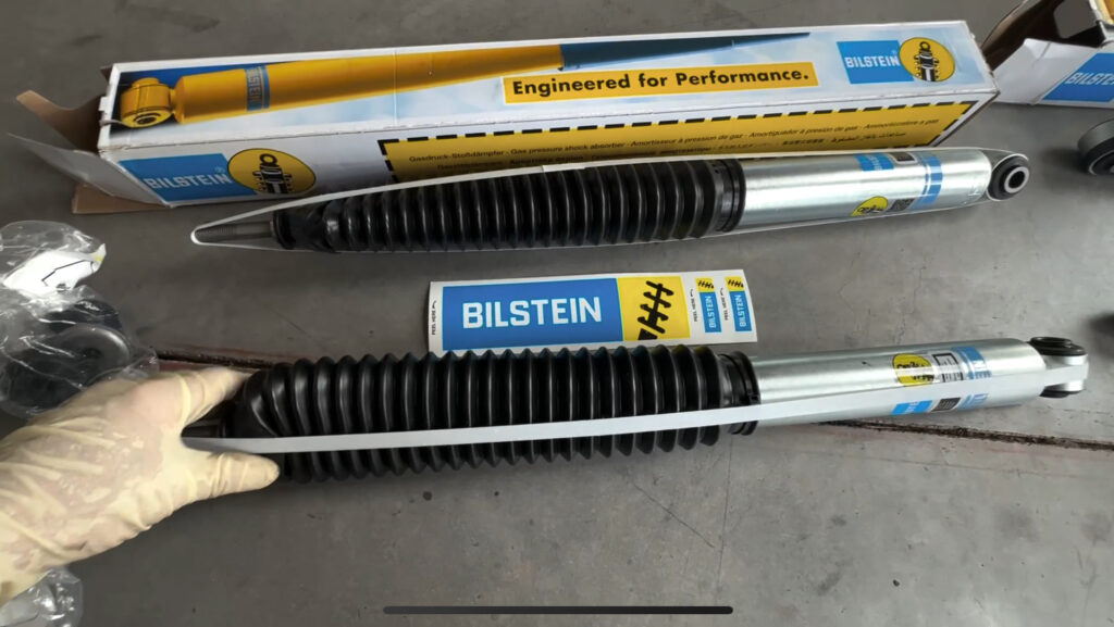 bilstein b8 5100 series shock absorbers 4wd being installed on a 1999 dodge ram 1500