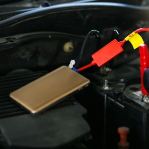 portable car jump starter and engine