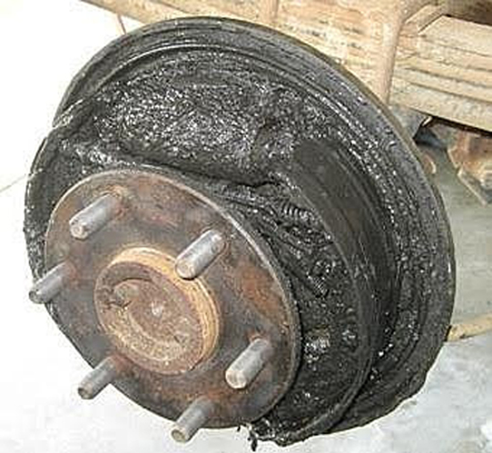 wet and greasy brakes may indicate a leaking axle seal or wheel cylinder