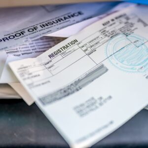 car registration papers and insurance