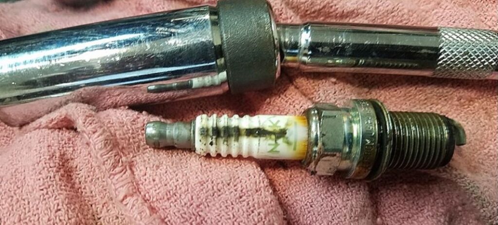 spark plug with carbon trace