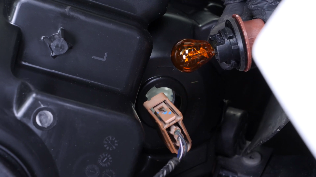 Replace turn signal bulb