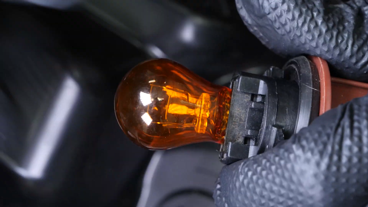 Replace turn signal bulb