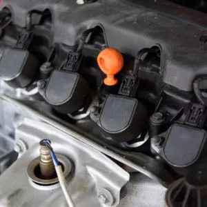 car engine with installed ignition coil